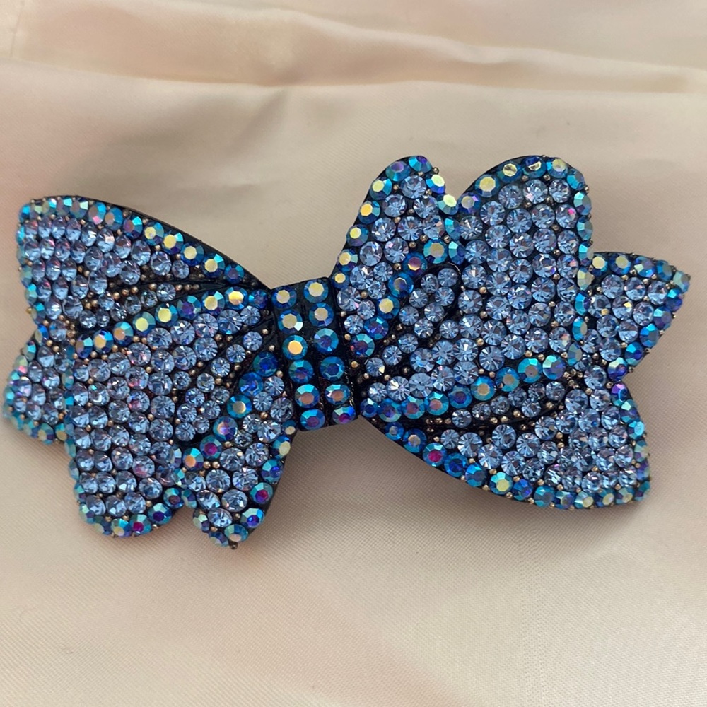 Hair clip beautiful bling crystal blue stones. Excellent condition.